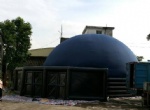 Portable inflatable planetarium dome for digital projection.