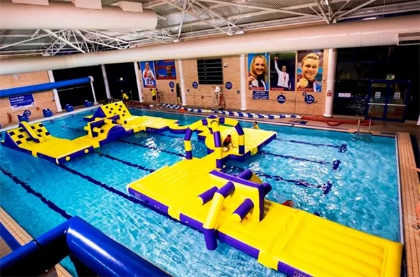 School swimming pool inflatable water park with obstacle course