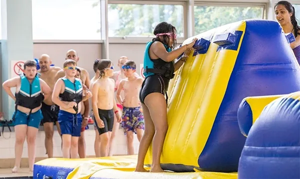 School swimming pool inflatable water park with obstacle course